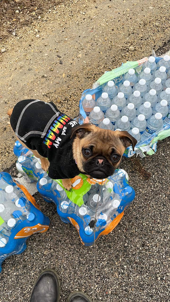 Managing the water station with Velma for the Tilted Kilt 5K
